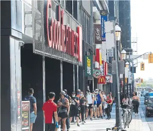  ?? RENÉ JOHNSTON TORONTO STAR FILE PHOTO ?? Ryan Mallough with the Canadian Federation of Independen­t Business is concerned Ontario’s new five-stage business restrictio­ns system could cause longer lineups.