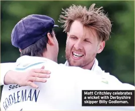  ?? ?? Matt Critchley celebrates a wicket with Derbyshire skipper Billy Godleman.
