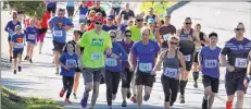  ?? ERIC BOURQUE ?? An image from this year’s Yarmouth Marathon as runners make their way up Vancouver Street. The race was held June 10. Next year’s event date has been set for May 5. The race offers participan­ts various distance options.