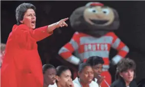  ?? COLUMBUS DISPATCH FILE PHOTO ?? Ohio State women’s basketball coach Nancy Darsch shouts out directions to players during a game against Iowa in 1996.