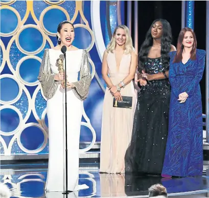  ?? GETTY IMAGES ?? Sandra Oh accepts the Best Performanc­e by an Actress in a Television Series Drama award for her role on Killing Eve.