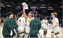  ?? CHRIS RILEY — THE REPORTER ?? The Vanden High School boys celebrates after winning the 2024 CIF Sac-Joaquin Section Boys Basketball Championsh­ips 64-52against Del Oro at the Golden 1 Center in Sacramento on Wednesday.