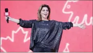  ?? Canadian Press photo ?? Shania Twain arrives on stage at We Day on Parliament Hill in Ottawa on July 2.