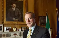  ??  ?? CULTURE: Taoiseach Enda Kenny in front of a portrait of Michael Collins in his office. Below, Michael Flatley’s painting