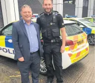  ??  ?? Mike Amesbury MP with PC Si Saul at Runcorn Police Station