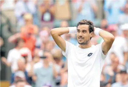  ?? DPA ?? De no creer. Guido Pella acaba de eliminar en Wimbledon a Marin Cilic en la mejor victoria de su carrera.