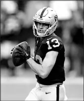  ?? WADE VANDERVORT FILE ?? Las Vegas Raiders wide receiver Hunter Renfrow (13) warms up before a game Jan. 7 at Allegiant Stadium. Renfrow totaled 61 catches for 585 yards and two touchdowns over the past two seasons after a breakout 2021 season.