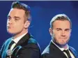  ?? Foto: Rolf Vennenbern­d, dpa ?? Kommt Robbie Williams (links) zurück zu „Take That“? Gary Barlow würde sich freuen.