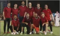  ?? ?? Qatar Legacy Ambassador­s took to the field in a friendly match that saw fans from Al Sadd SC take on Al Rayyan SC supporters ahead of the AmirCup final and the opening of Al Thumama Stadium on Friday. Ronald de Boer is on right (front row).