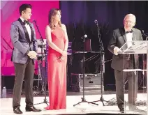  ?? GAËLLE VUILLAUME ?? HONOURING THE HONOUREE: Montreal Heart Institute Foundation board chair Lino Saputo Jr. and foundation president-CEO Josée Noiseux present businessma­n-philanthro­pist Jean-Pierre Léger with the institute’s Medal Of Honour at the Grand Bal des Vins-Coeurs.