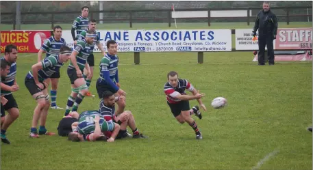  ??  ?? Dennis Higgins gets the Wicklow backs moving.