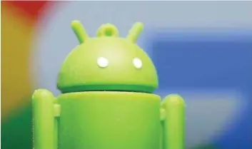  ?? — Reuters ?? A 3D printed Android mascot Bugdroid is seen in front of a Google logo in this illustrati­on.