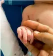  ??  ?? image of the new-born baby’s little hand
