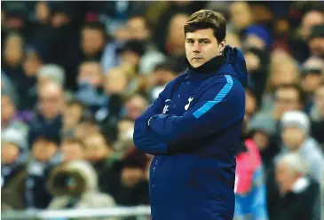  ?? AFP ?? Tottenham manager Mauricio Pochettino watches from the touchline during a recent match.
