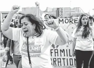  ?? CHERYL EVANS/THE REPUBLIC ?? Rosa Maria Soto of Phoenix joins others in a march to the Immigratio­n and Customs Enforcemen­t office in Phoenix on Saturday to protest the federal government’s deportatio­n policies.