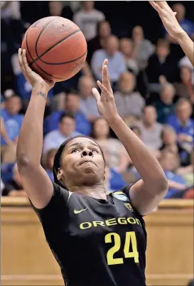  ?? Gerry Broome / The Associated Press ?? Oregon’s Ruthy Hebard (24) shoots during the second half of Monday’s second-round game in the in Durham, N.C. Oregon won 74-65.