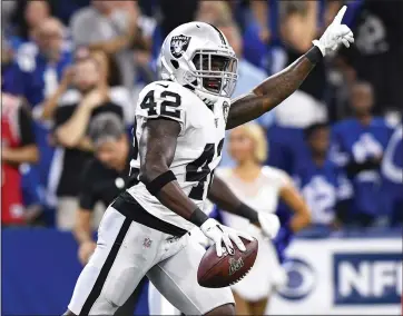  ?? DOUG MCSCHOOLER — THE ASSOCIATED PRESS ?? Raiders safety Karl Joseph celebrates a fumble recovery against the Indianapol­is Colts in the first half of Sunday’s win.