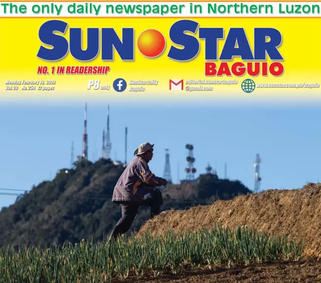  ?? Photo by Jean Nicole Cortes ?? WORK BEGINS AT DAWN. A farmer tends to his crops at dawn at Mt. Santo, Tomas Tuba Benguet.