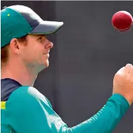  ?? — AFP ?? Australia’s captain Steve Smith prepares to bowl in the nets at Melbourne cricket Ground on Monday.
