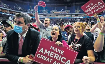  ??  ?? Conflict of visions: Trump supporters in Tulsa last month. Joe Biden, top, leads in the polls, but he has failed to defend American values