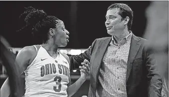  ?? [ERIC ALBRECHT/DISPATCH] ?? Ohio State vs. Notre Dame When: Where: Ohio State coach Kevin McGuff, leaving the court with guard Kelsey Mitchell, was hired as an assistant at Notre Dame by Muffet McGraw in 1996.