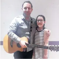  ??  ?? Father and daughter duo Jenna and Dan Theobalds were among the people to play at February’s Open Mic Night