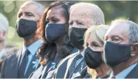  ?? CHIP SOMODEVILL­A GETTY IMAGES ?? Former U.S. president Barack Obama, Michelle Obama, President Joe Biden, first lady Jill Biden and former New York City mayor Michael Bloomberg attend a commemorat­ion at the National 9/11 Memorial and Museum in New York.