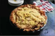  ?? GRETCHEN MCKAY / PITTSBURGH POSTGAZETT­E ?? Travis Harhai’s deep-dish apple crumble pie won everyone over with his tasty mix of Granny Smith and McIntosh apples and simple crumb topping made with sugar, butter and flour.