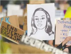  ?? — GETTY IMAGES FILES ?? Police and correction­al officers are not allowed to take part in this year’s Pride Parade as people around the world protest police brutality against Black people, including Breonna Taylor, pictured.