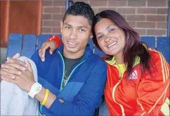  ?? PICTURE: SUPPLIED ?? 400m World and olympic champion with his mother, Odessa Swarts, Bloemfonte­in.