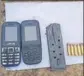  ??  ?? The two mobile phones, a magazine of a pistol, six live cartridges and the contraband recovered by the BSF from the Indo-Pak border in Tarn Taran on the intervenin­g night of Friday and Saturday.
HT PHOTO