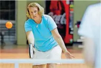  ?? [PHOTOS BY BRYAN TERRY, THE OKLAHOMAN] ?? ABOVE: Fitzgerald plays pickleball in Norman.