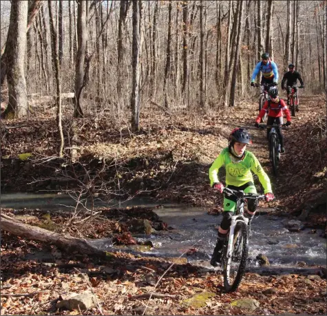  ?? ?? Young guns showing how creek crossings are done at a past Buffalo Headwaters Challenge.