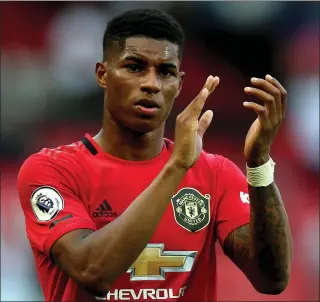  ?? ?? Footballer and food-poverty campaigner Marcus Rashford has written a children’s book