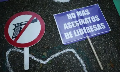  ?? Photograph: Luisa González/Reuters ?? A sign reading ‘No more murders of women leaders’ during a peace vigil in Bogota in May. Such murders have not slowed since Gustavo Petro took office.