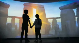  ?? CLARE KENDALL/ ENGLISH HERITAGE ?? The English Heritage Stonehenge exhibition and visitor centre is a virtual 360-degree experience that lets visitors “stand in the stones” before they enter the gallery.