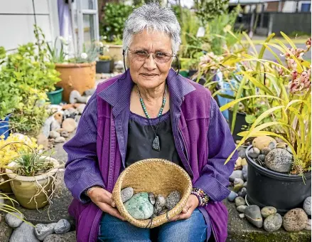  ?? VANESSA LAURIE/STUFF ?? Lyn Ratahi spends hours cutting, shaping and polishing her handpicked rocks into objects of beauty.