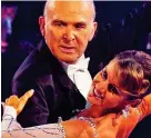  ??  ?? Foxtrot: Sir Vince dances with Erin Boag on Strictly in 2010