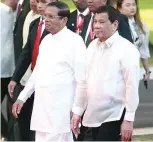  ??  ?? SRI-LANKA PRESIDENT Maithripal­a Sirisena with President Rodigo R. Duterte.