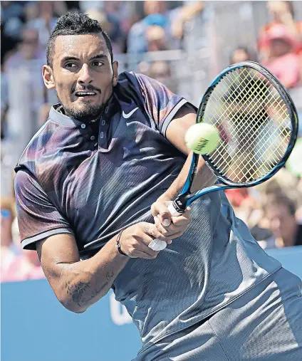  ??  ?? Combustibl­e: Nick Kyrgios was carrying a shoulder injury and was hit with two code of conduct penalty points