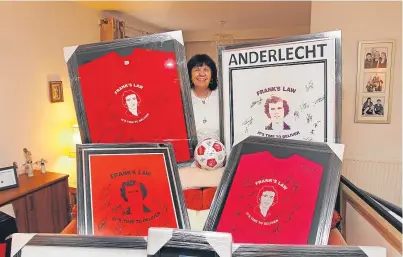  ?? Picture: Gareth Jennings. ?? Amanda Kopel with some of the signed shirts that will be auctioned to raise cash for the Frank Kopel Foundation.