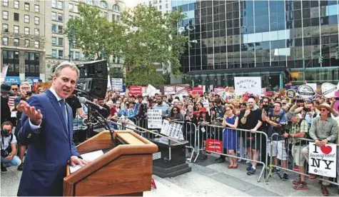  ?? AFP ?? Eric Schneiderm­an speaks at a rally to defend young immigrants. New York state’s top prosecutor and public champion of the #MeToo movement resigned yesterday, just hours after being accused of physically assaulting four women.