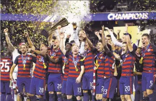  ?? Ben Margot / Associated Press ?? U.S. players celebrate after beating Jamaica 2-1 in the Gold Cup final at Levi’s Stadium, winning a trophy that the Americans have earned only once in the past decade.