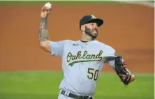  ?? Tom Pennington / Getty Images ?? A’s starter Mike Fiers allowed one unearned run and three hits in six innings against the Rangers in Arlington.