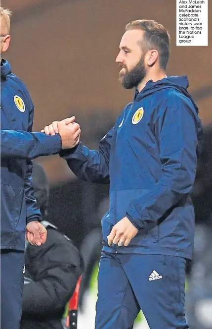  ??  ?? Alex Mcleish and James Mcfadden celebrate Scotland’s victory over Israel to top the Nations League group