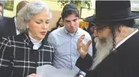  ?? ( Andrew Lichtenste­in/ Getty Images/ TNS) ?? DEBORAH LAUTER, the director of the New York City Office for the Prevention of Hate Crimes, attends a news conference in Brooklyn to denounce the deadly hate crime shooting in Jersey City, N. J., last month.