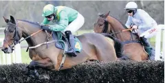  ??  ?? AIGLE OF ATTACK Progressiv­e chaser raise the Saltire at Aintree