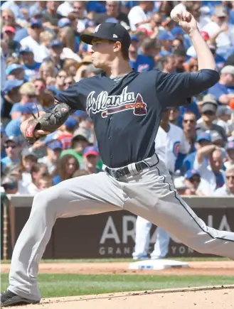  ?? (Photo by Matt Marton, AP) ?? Atlanta Braves starting pitcher Max Fried delivers during the first inning of Sunday’s game against the Chicago Cubs.