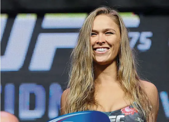  ??  ?? At 29, ronda rousey is now the world’s most famous woman fighter. — AP