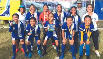  ?? CONTRIBUTE­D PHOTO ?? FOOTBALL CHAMPS. Ateneo de Davao University Lady Blue Knights team celebrates the championsh­ip victory in the recently-concluded 1st Rizal Memorial Colleges (RMC) Football Festival at Tionko field.